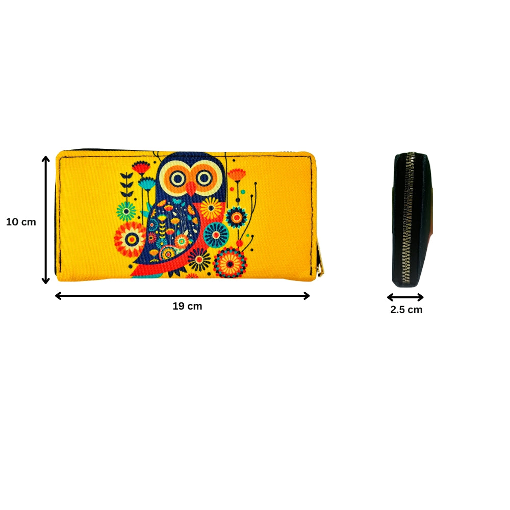 A woman displays a yellow canvas wallet featuring a cute owl design.